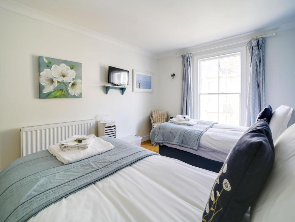 Postel nebo postele na pokoji v ubytování The Artist Loft, Ensuite Guest Rooms, Porthleven