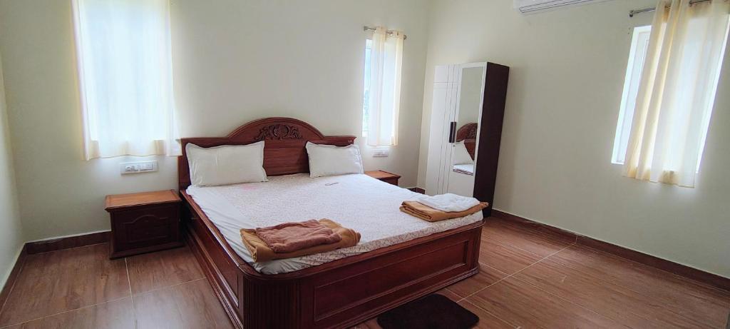 Postel nebo postele na pokoji v ubytování BEaCHA VILLA