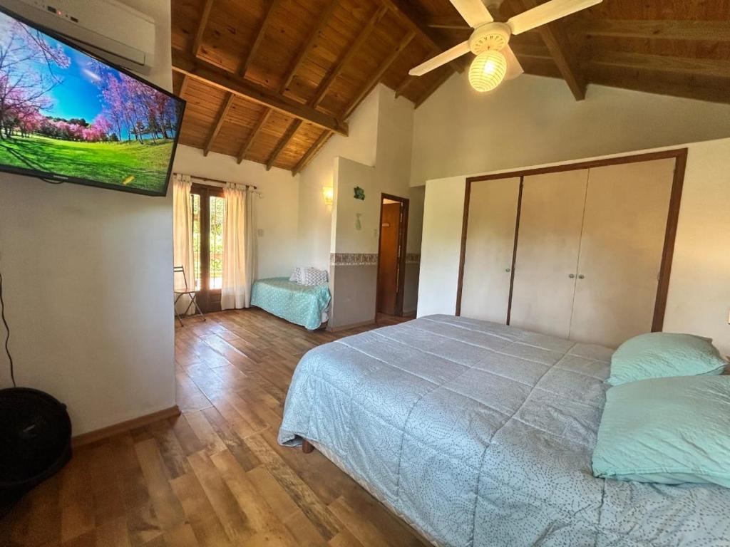 Postel nebo postele na pokoji v ubytování CASADELGOLF Villa Gesell