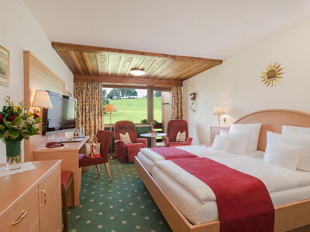 Postel nebo postele na pokoji v ubytování Kaisers Tanne - Premium Alles Inklusive Hotel