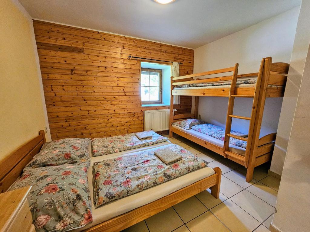Posteľ alebo postele v izbe v ubytovaní Apartmány Ski areal Kareš