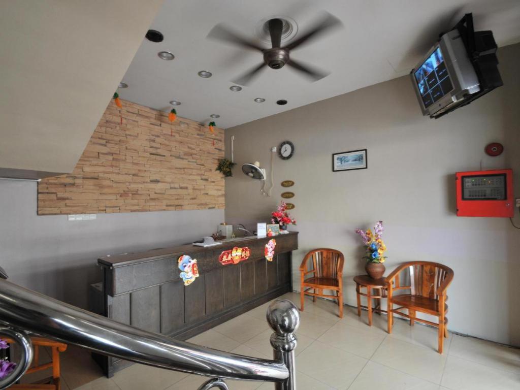 TV a/nebo společenská místnost v ubytování I-Winton Hotel