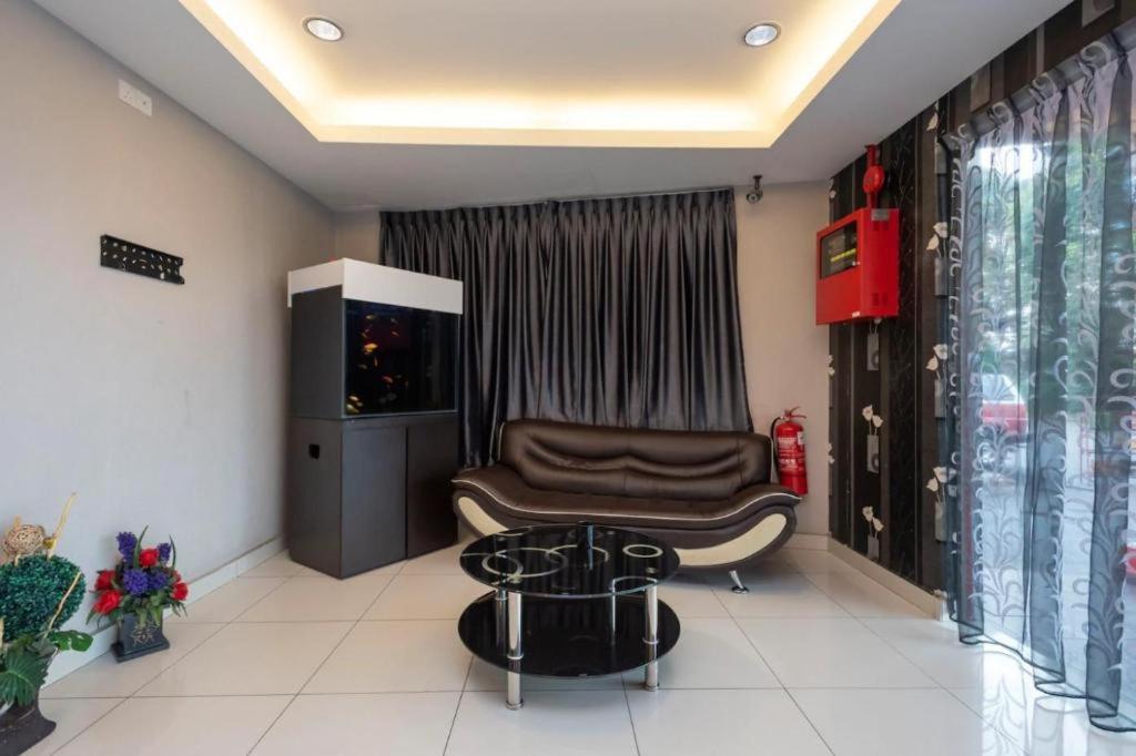 Posezení v ubytování Hotel Aromas Kulai