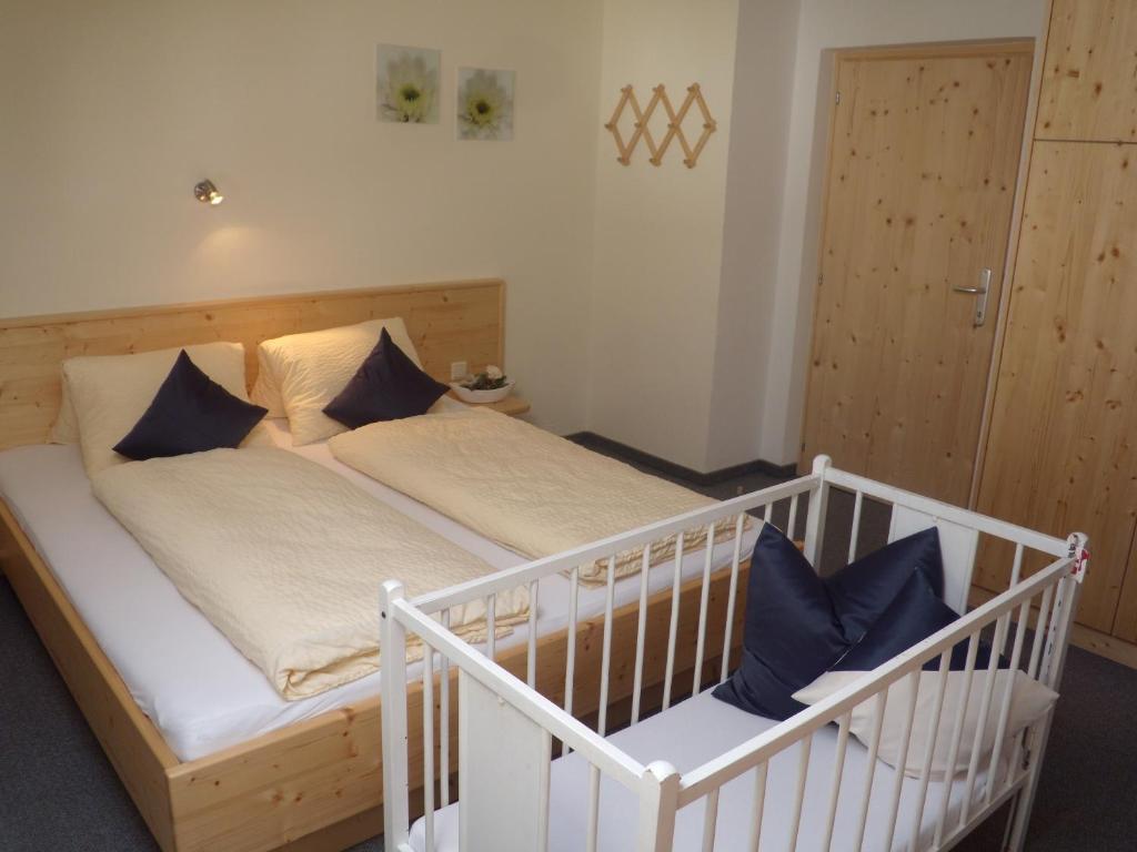 Postel nebo postele na pokoji v ubytování Appartements Schweiberer