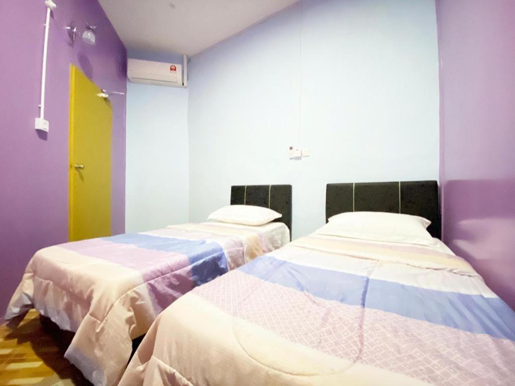 Katil atau katil-katil dalam bilik di SPOT ON 89986 P&p Inn