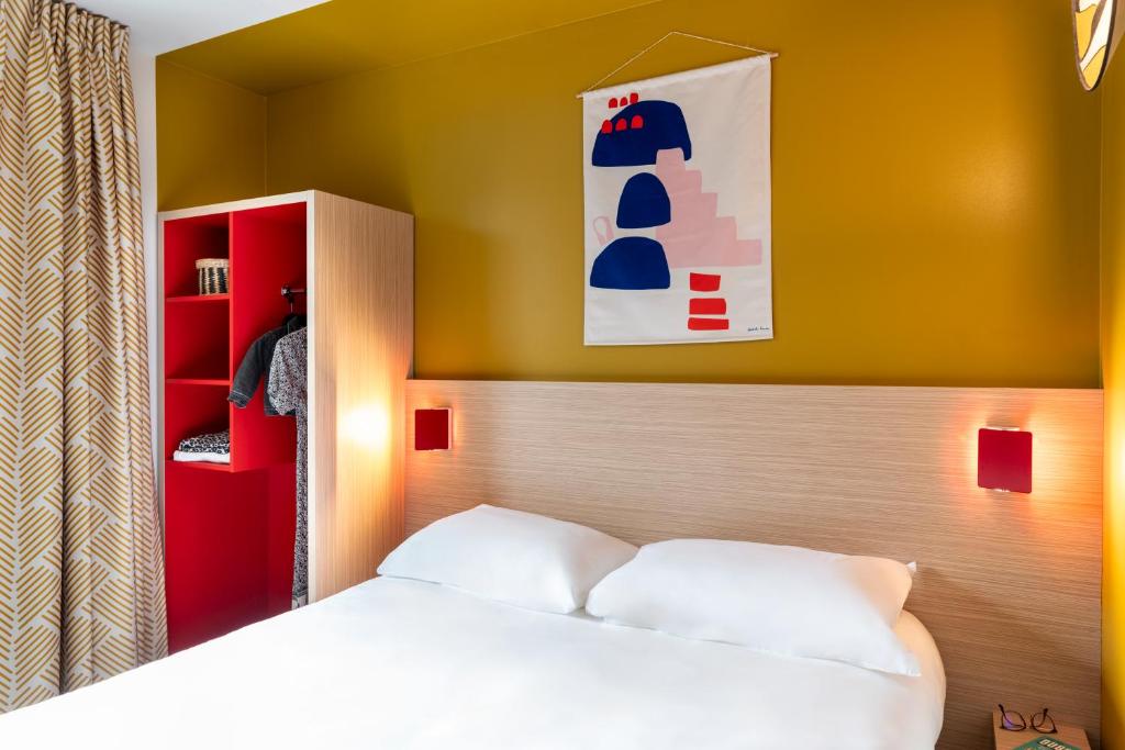 Postel nebo postele na pokoji v ubytování ibis Styles Prévessin Genève Aéroport