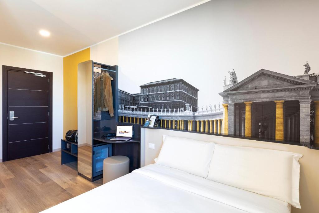 Postel nebo postele na pokoji v ubytování B&B Hotel Roma Fiumicino Aeroporto Fiera 1