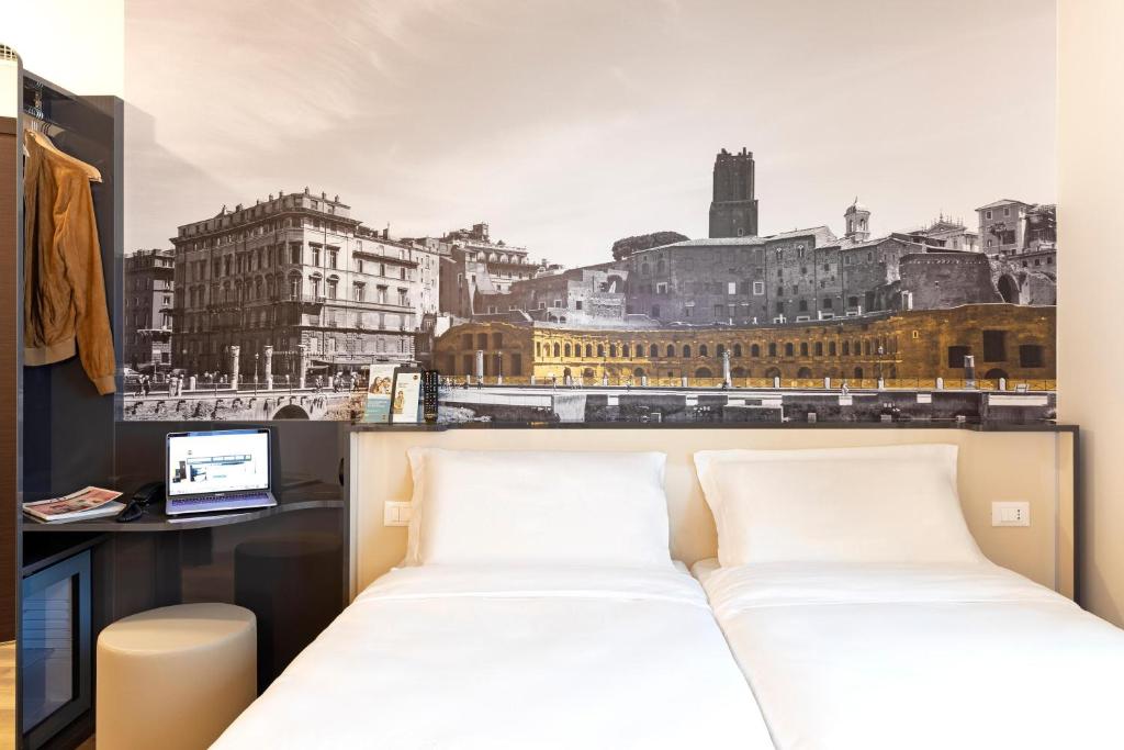 Postel nebo postele na pokoji v ubytování B&B Hotel Roma Fiumicino Aeroporto Fiera 1