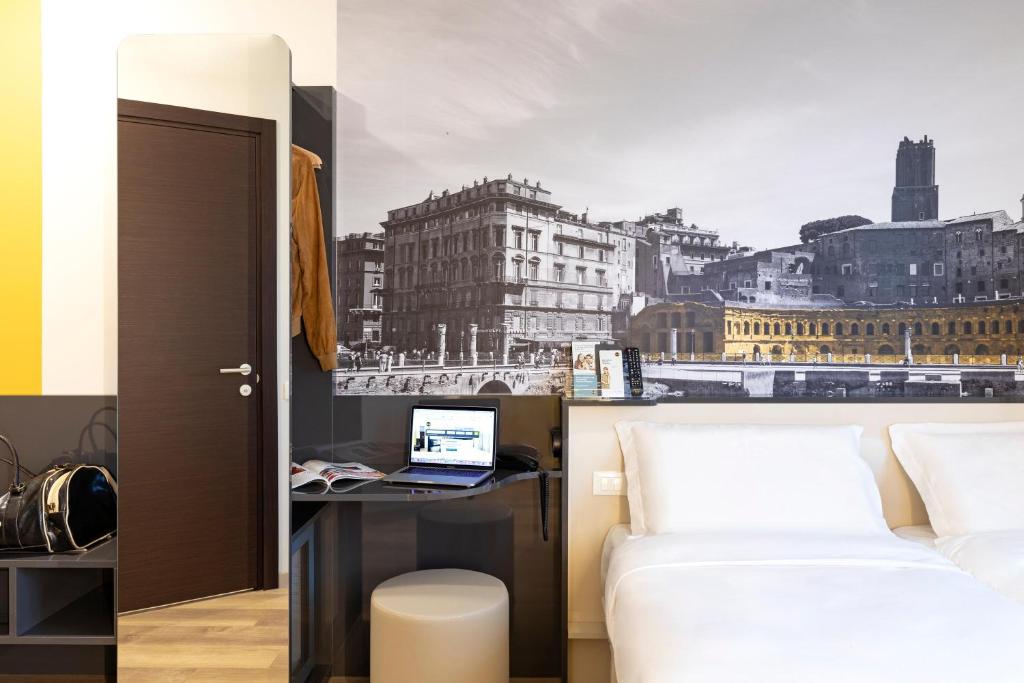 Postel nebo postele na pokoji v ubytování B&B Hotel Roma Fiumicino Aeroporto Fiera 1