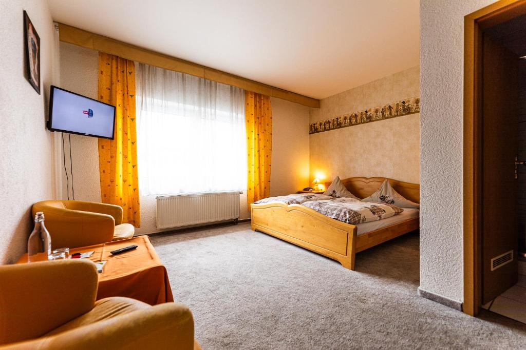 TV a/nebo společenská místnost v ubytování Gästehaus Strieth