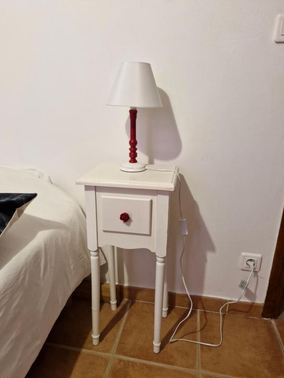Un ou plusieurs lits dans un hébergement de l'établissement Chambres d'hôtes à Pêtre