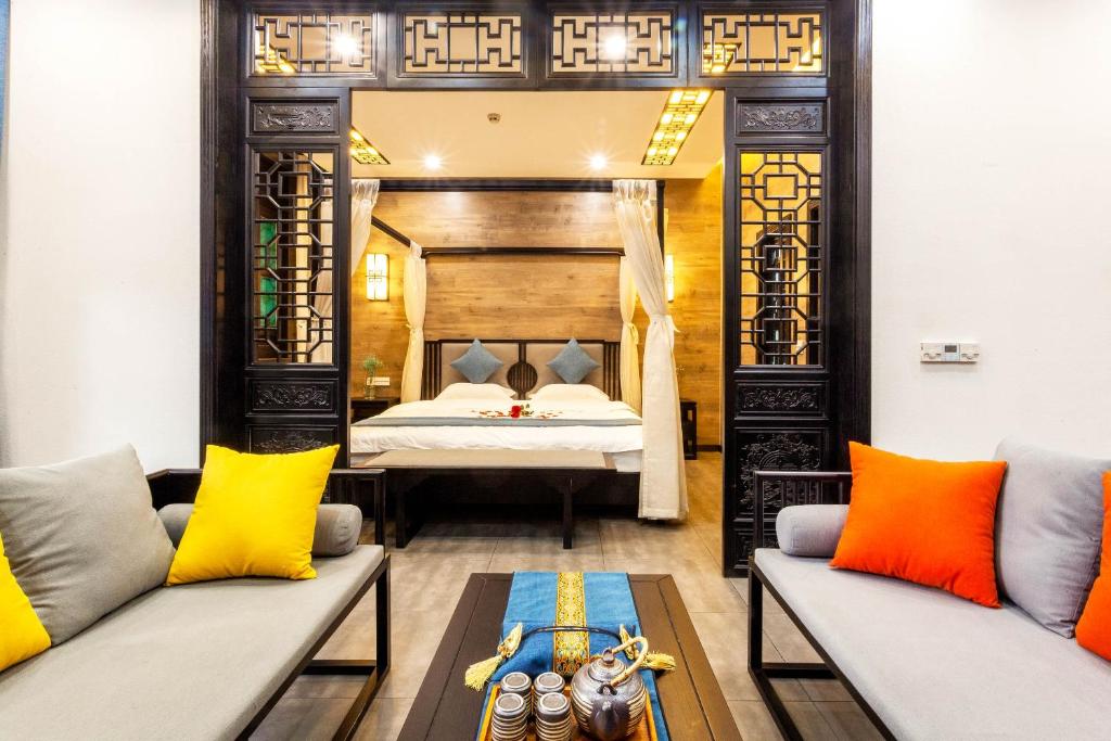 Postel nebo postele na pokoji v ubytování Pingyao Ziwenge Inn