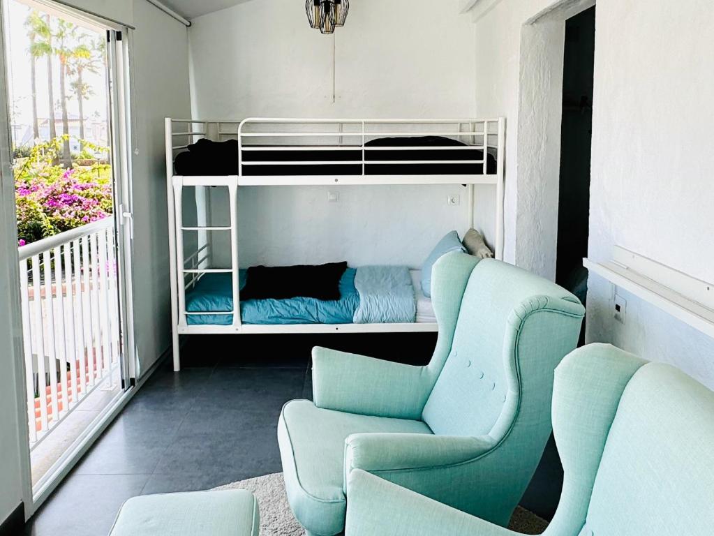 Posezení v ubytování Playa Paraíso 86 - Family Holiday in a Townhouse at the Beach