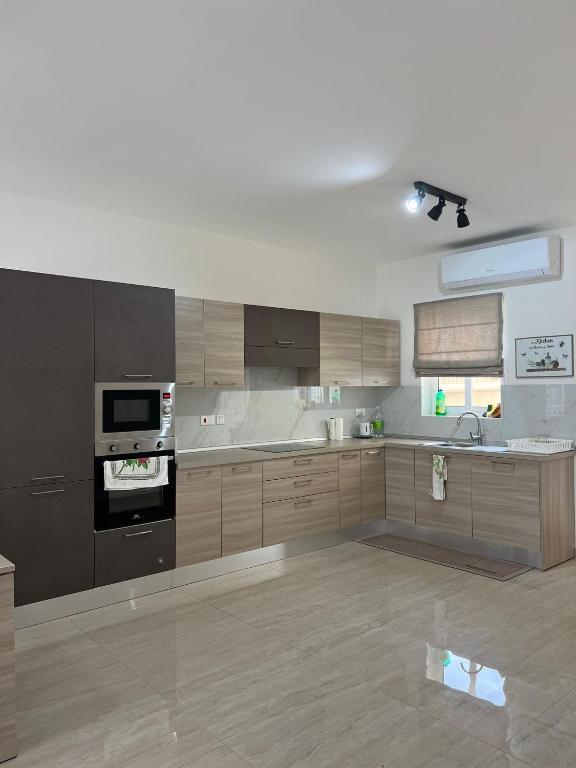 Kuchyň nebo kuchyňský kout v ubytování Magical modern apartment