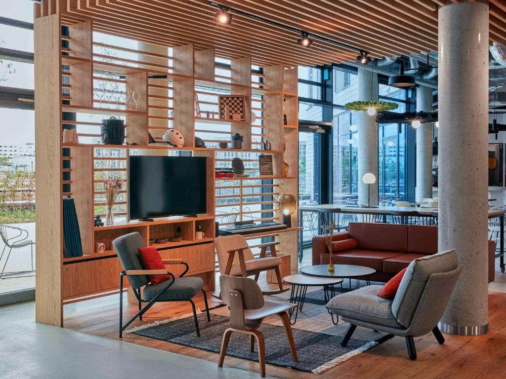 TV a/nebo společenská místnost v ubytování Aparthotel Adagio Heidelberg