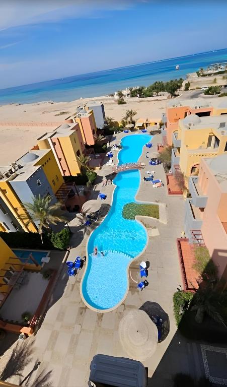 an aerial view of a resort with a swimming pool at Al-Dora Resort Hurghada in Hurghada