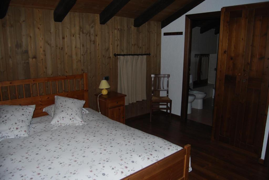A bed or beds in a room at B&B della Miniera
