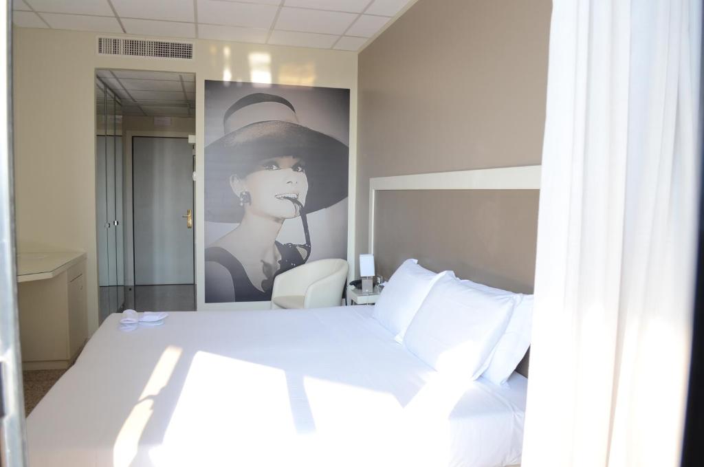 Postel nebo postele na pokoji v ubytování Hotel Diamante
