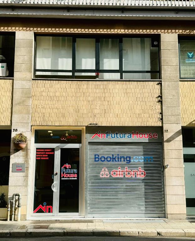 a building with a door and a book store at Urban Chic Home in Bari