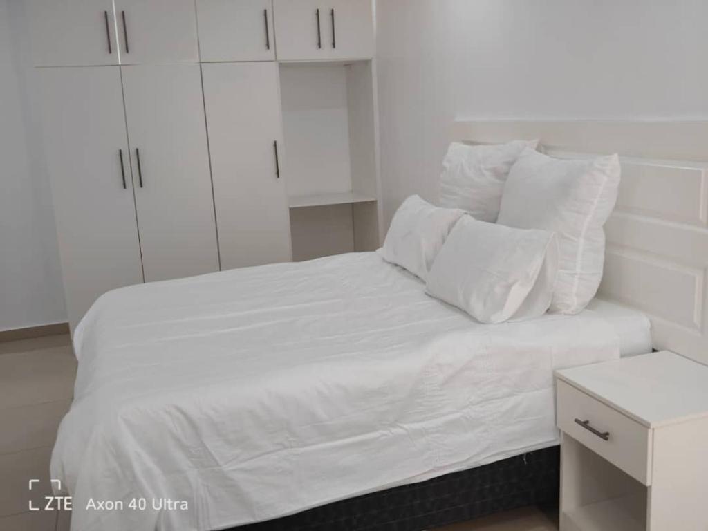 Ένα ή περισσότερα κρεβάτια σε δωμάτιο στο Silver Moon