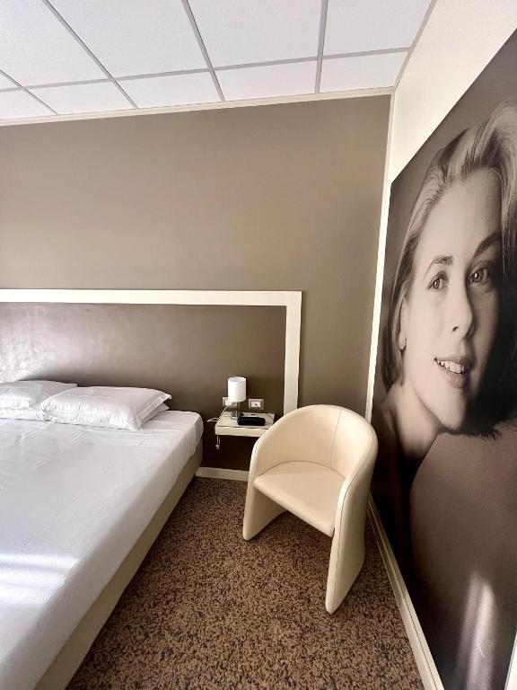 Postel nebo postele na pokoji v ubytování Hotel Diamante