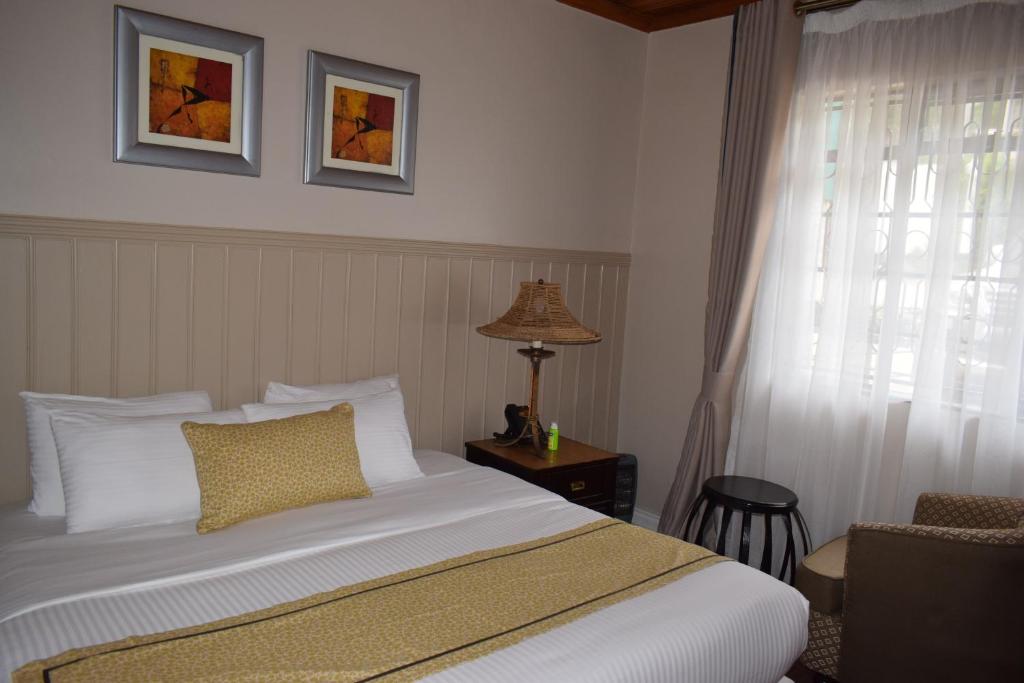 Postel nebo postele na pokoji v ubytování Cozy Stead