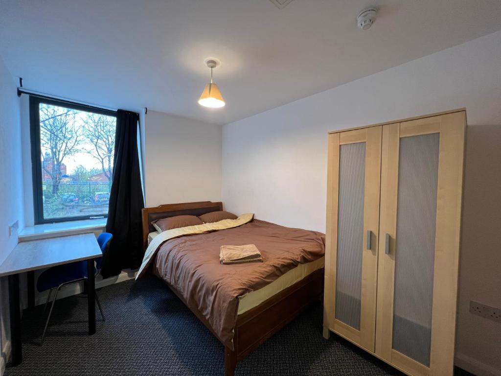 Postel nebo postele na pokoji v ubytování Sun House