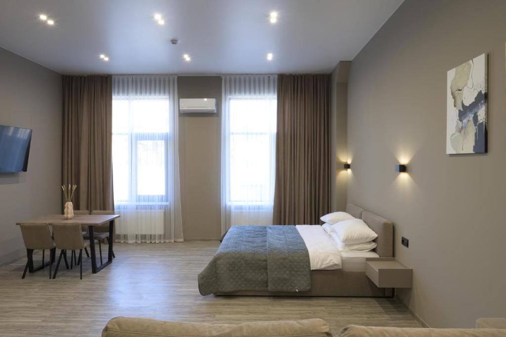Postel nebo postele na pokoji v ubytování REST INN apart hotel