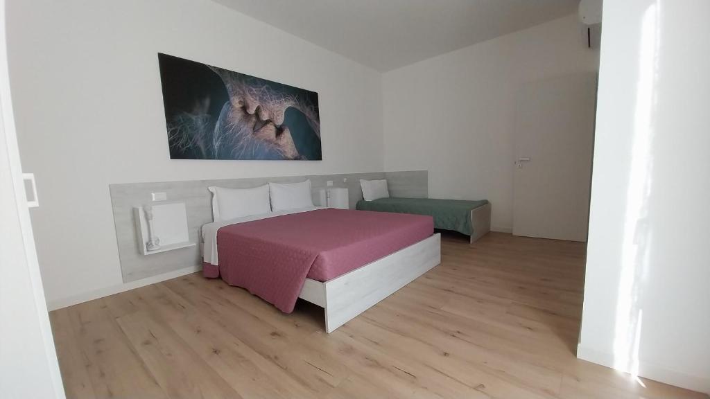 Postel nebo postele na pokoji v ubytování Via San Zeno Home