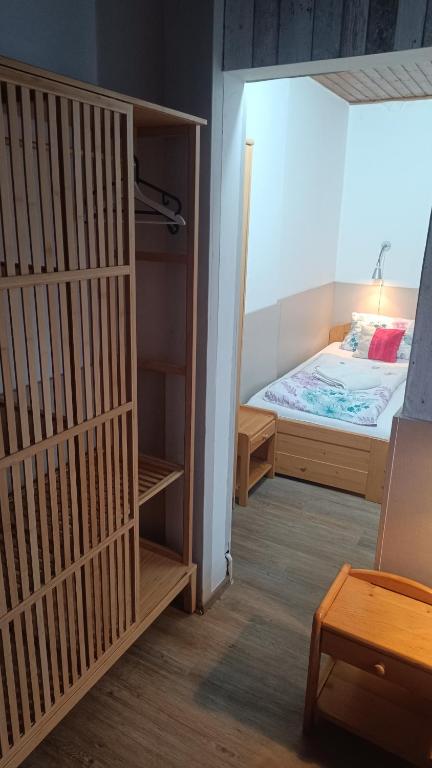 Postel nebo postele na pokoji v ubytování Hotel Kormoran