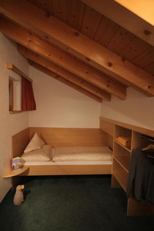 Postel nebo postele na pokoji v ubytování dr'Berghof