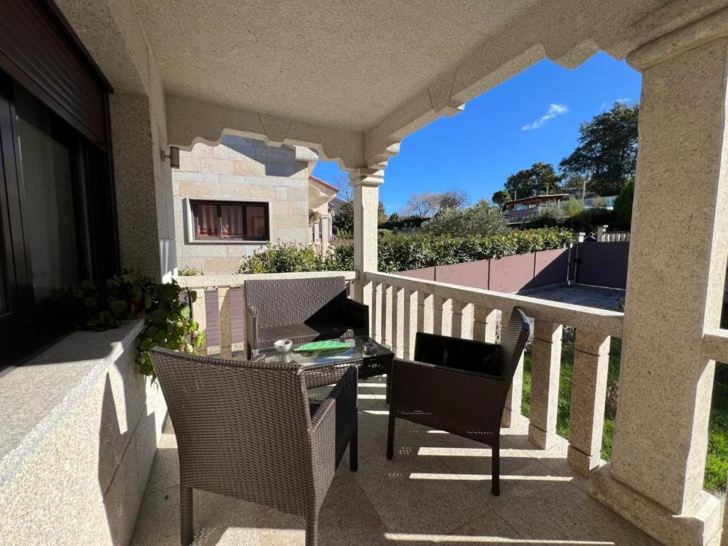 En balkon eller terrasse på YourHouse Fontevella II