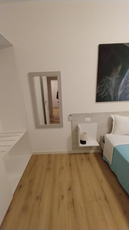 Postel nebo postele na pokoji v ubytování Via San Zeno Home