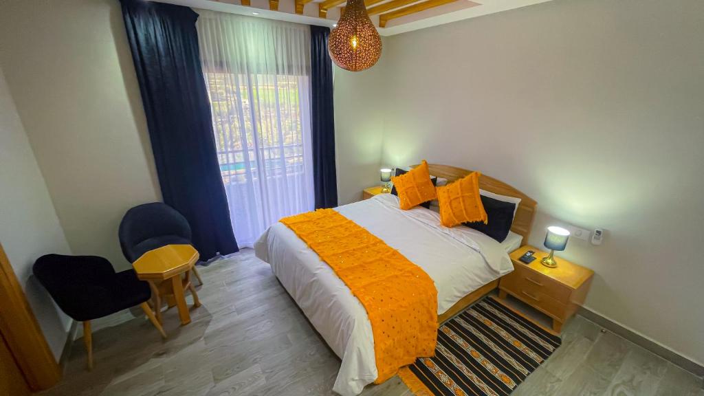 Postel nebo postele na pokoji v ubytování Ferme d'hôtes Bladna Garden