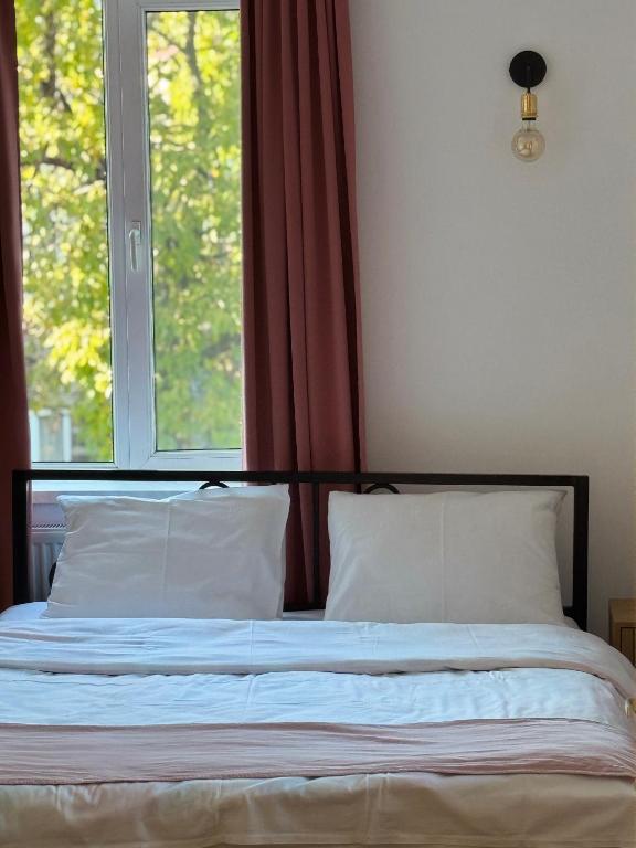 Postel nebo postele na pokoji v ubytování Kantora19