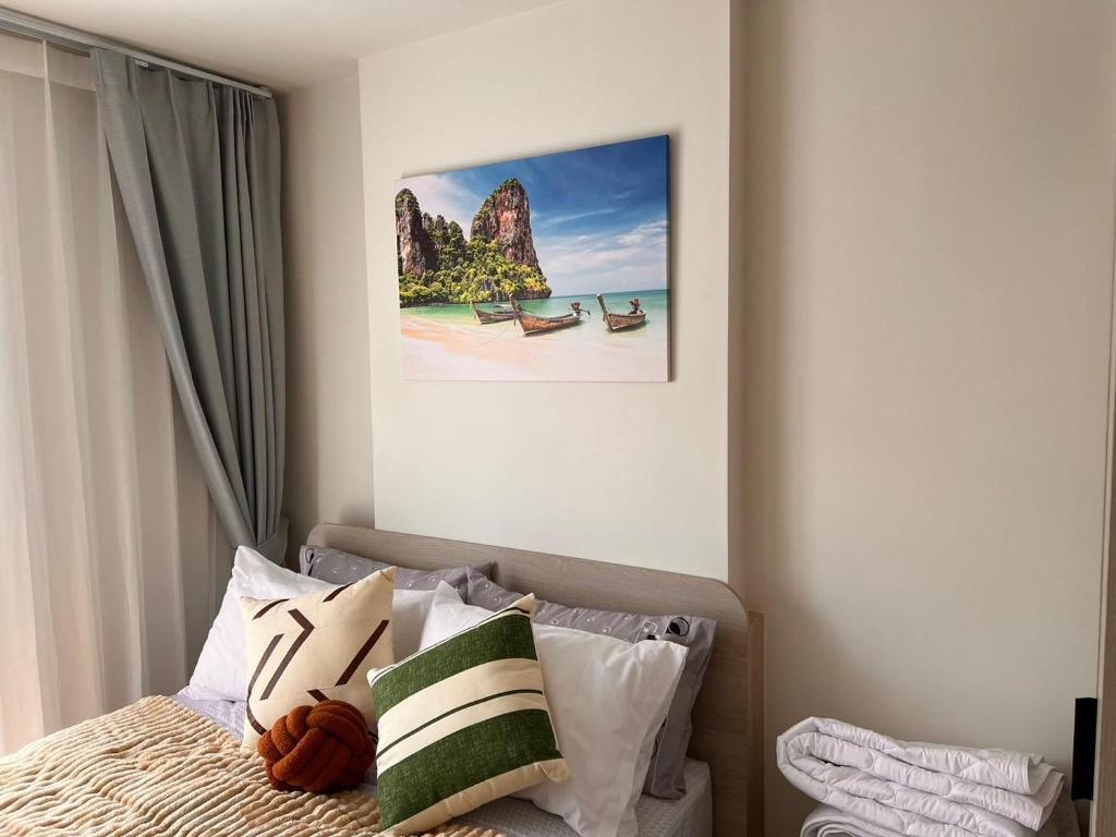 Postel nebo postele na pokoji v ubytování Dcondo Reef Modern Condos 1&2 Bedrooms