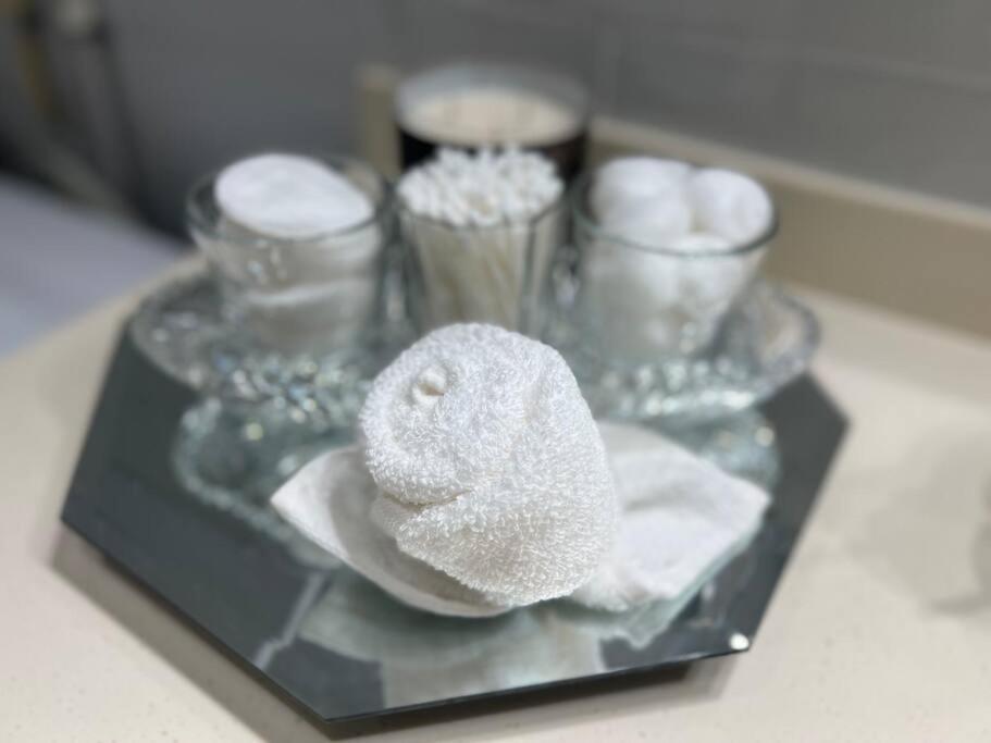 a glass tray with a stuffed animal on top of it at Phoenix Apartments in Calliste Land Settlement