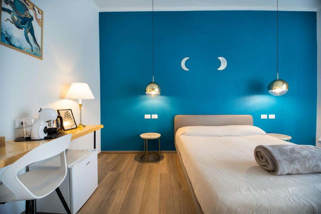 Postel nebo postele na pokoji v ubytování Bianca Elegance Rooms