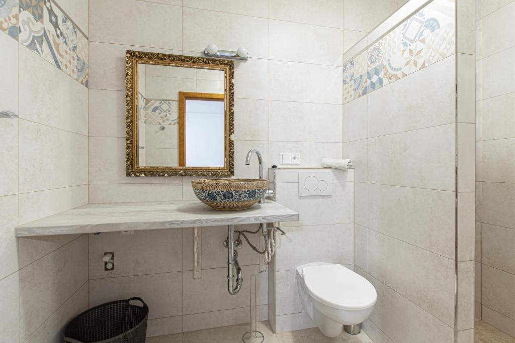 Koupelna v ubytování Apartmány Uprostřed zeleně