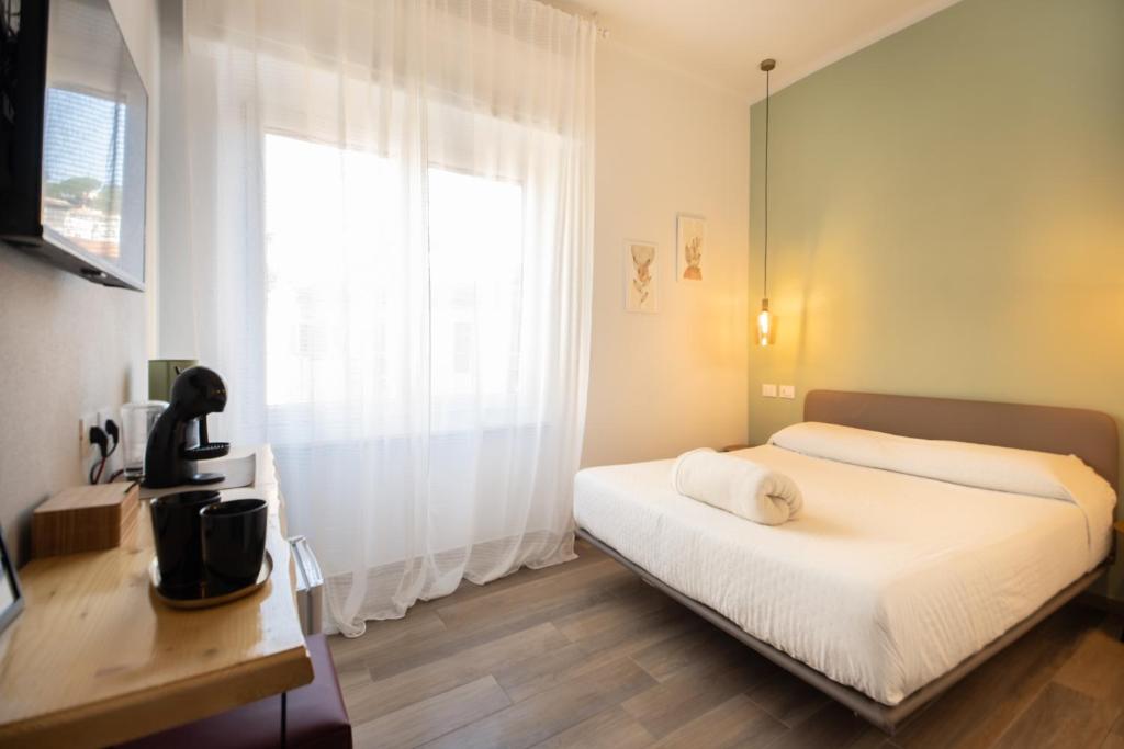 Postel nebo postele na pokoji v ubytování Bianca Elegance Rooms