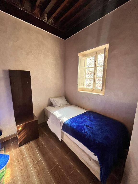 Postel nebo postele na pokoji v ubytování Riad 052