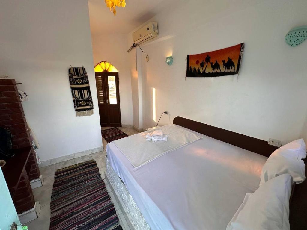 Postel nebo postele na pokoji v ubytování Amanda beach hotel