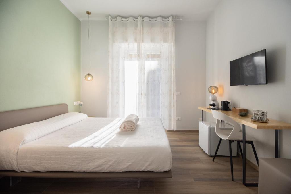 Postel nebo postele na pokoji v ubytování Bianca Elegance Rooms