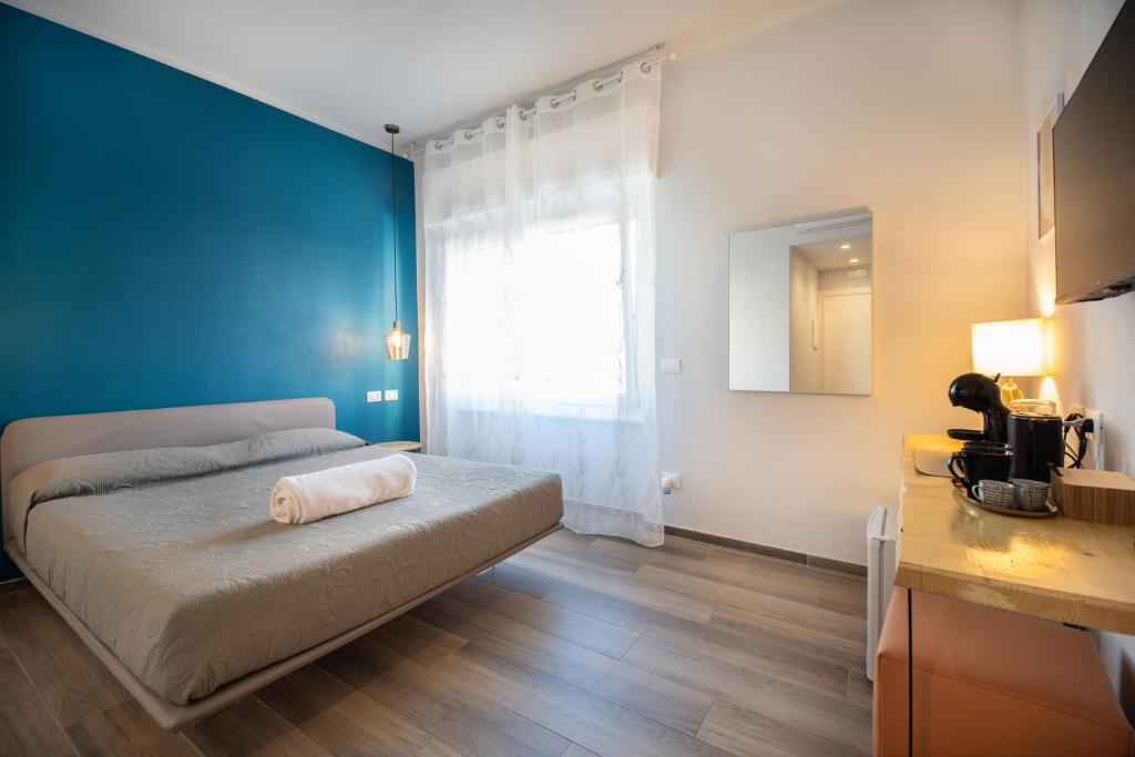 Postel nebo postele na pokoji v ubytování Bianca Elegance Rooms