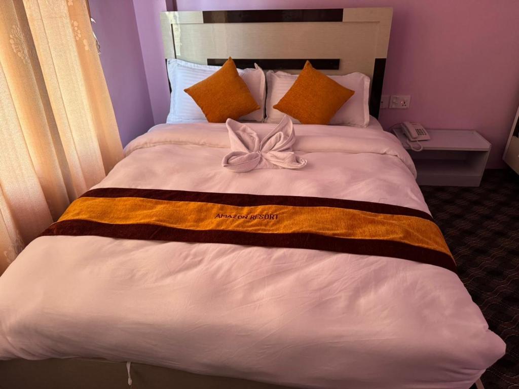 Letto o letti in una camera di Amazon Resort