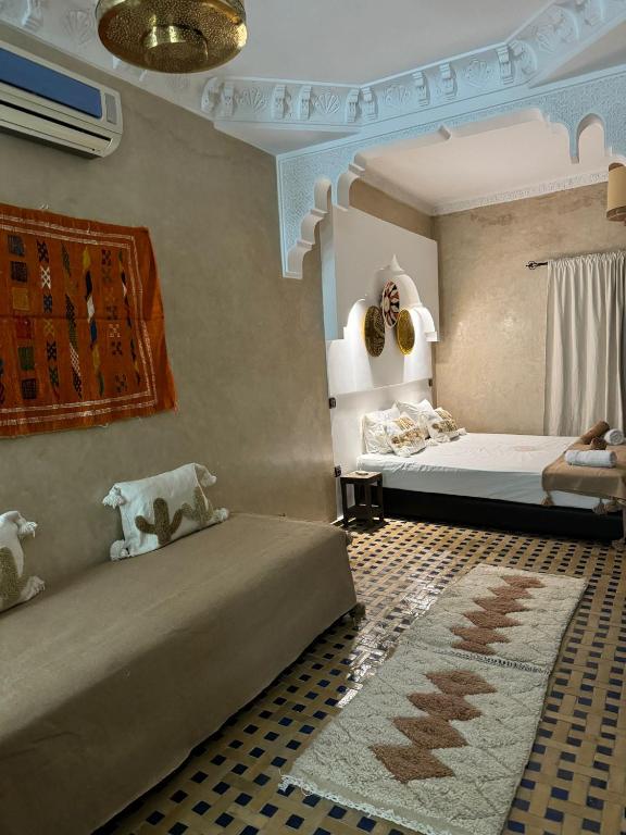 Postel nebo postele na pokoji v ubytování Riad dar serenity