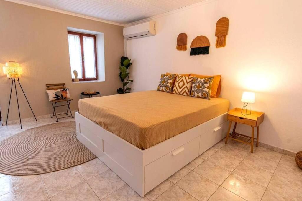 Postel nebo postele na pokoji v ubytování Samora Guest House