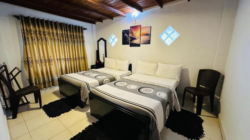 Postel nebo postele na pokoji v ubytování Nuwara Eliya Holiday Home