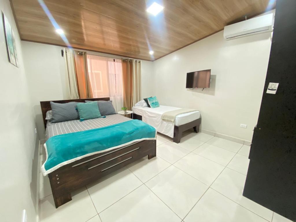 Postel nebo postele na pokoji v ubytování Apartamento H Gonzalez 14 free Parking AC wifi