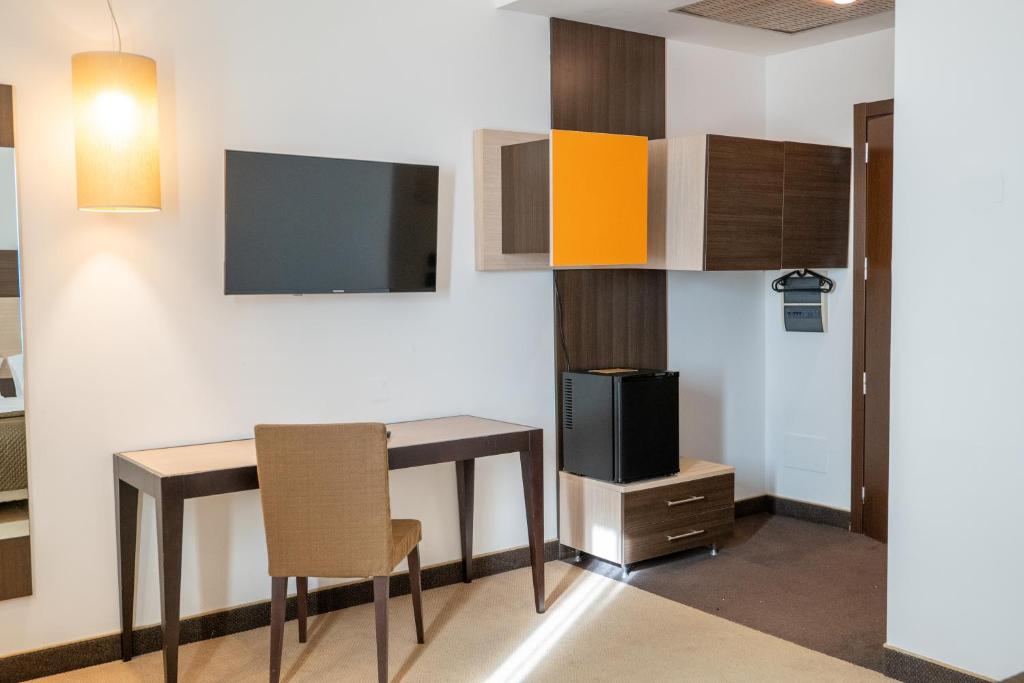 TV a/nebo společenská místnost v ubytování NSM Hotel Palace Lucera